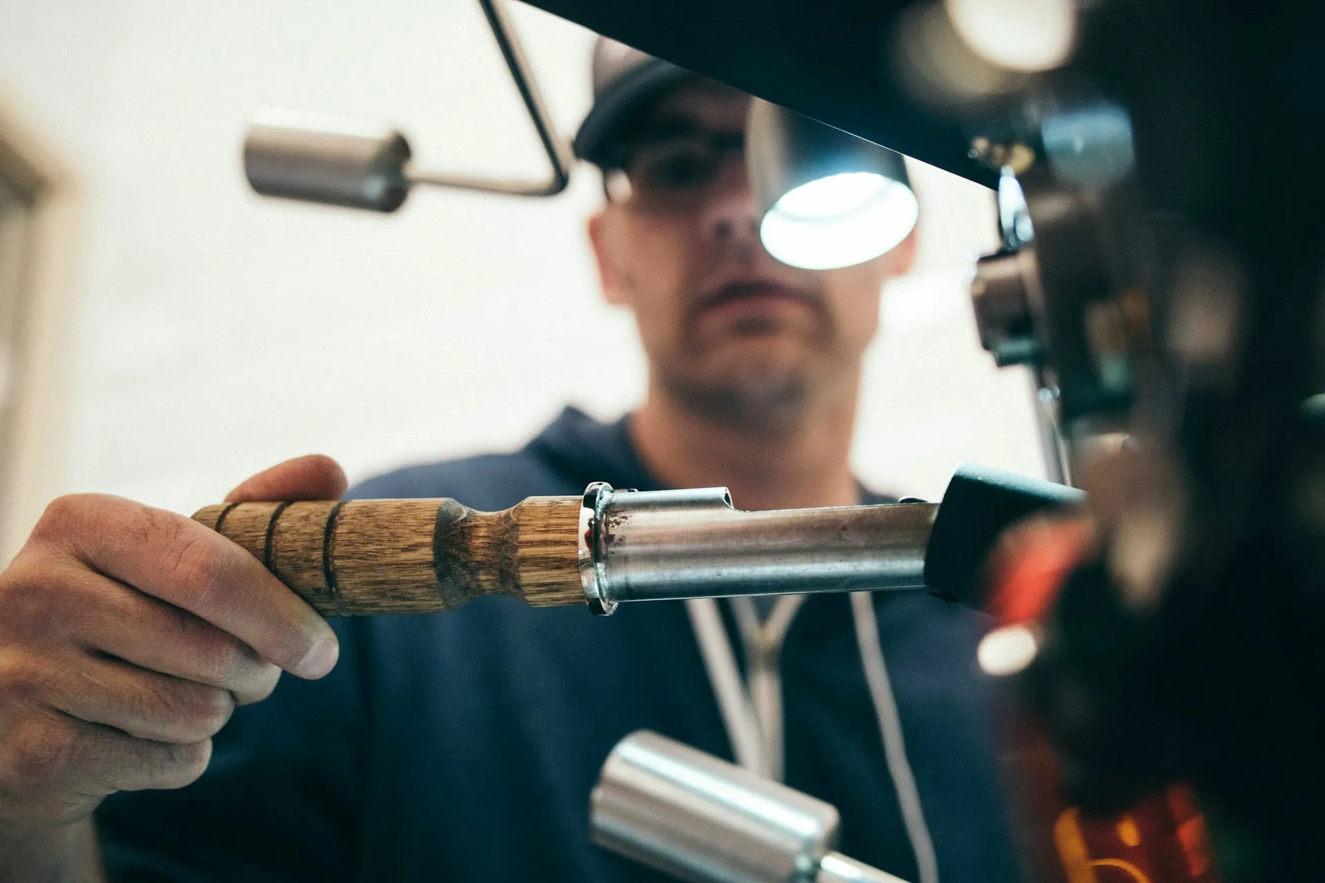 Technician performing preventive maintenance in a hotel