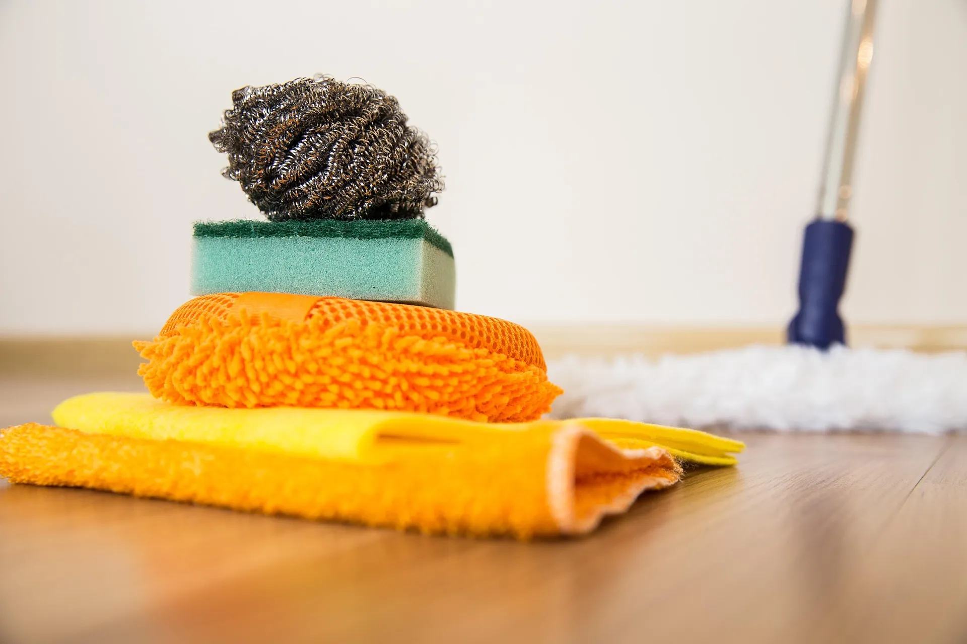 Dust and debris in a carpet corner that guests notice if missed